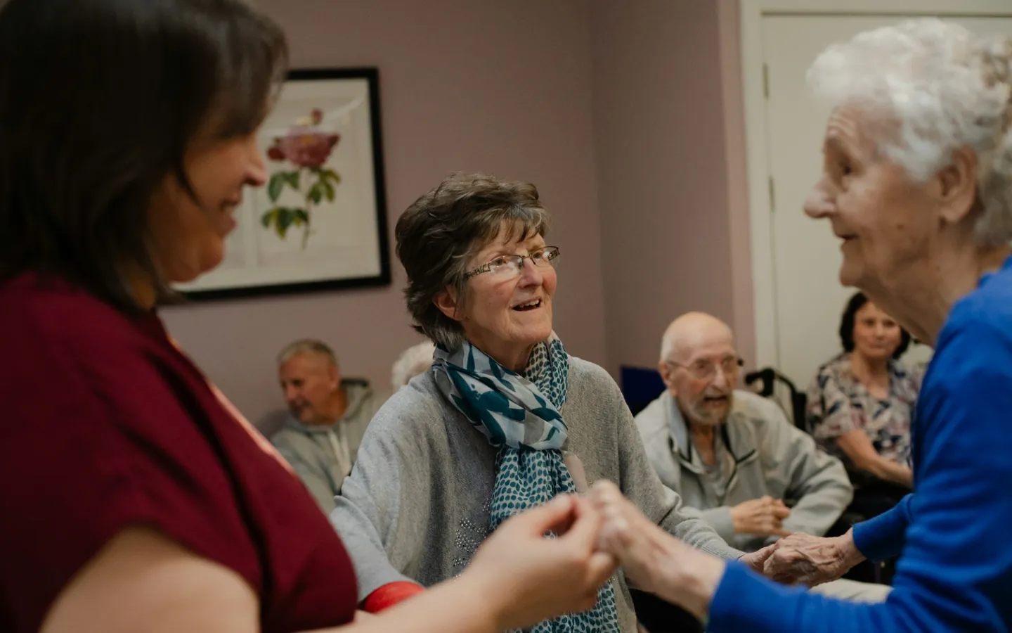 Residents enjoying time together with Menwinnion's professional carers